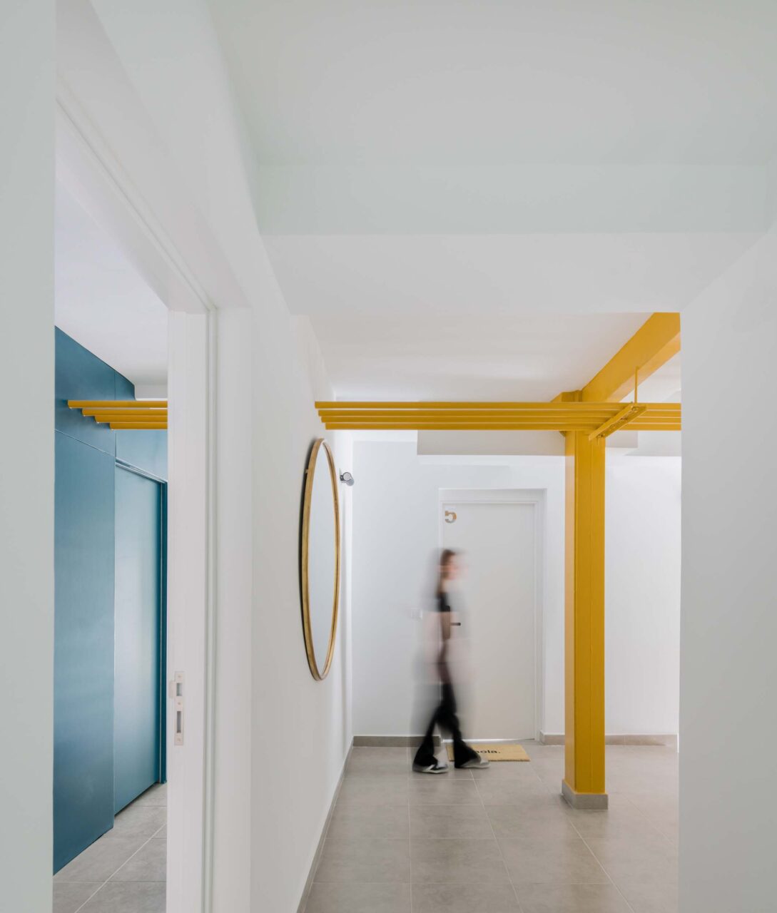 Hallway with yellow columns in Madrid