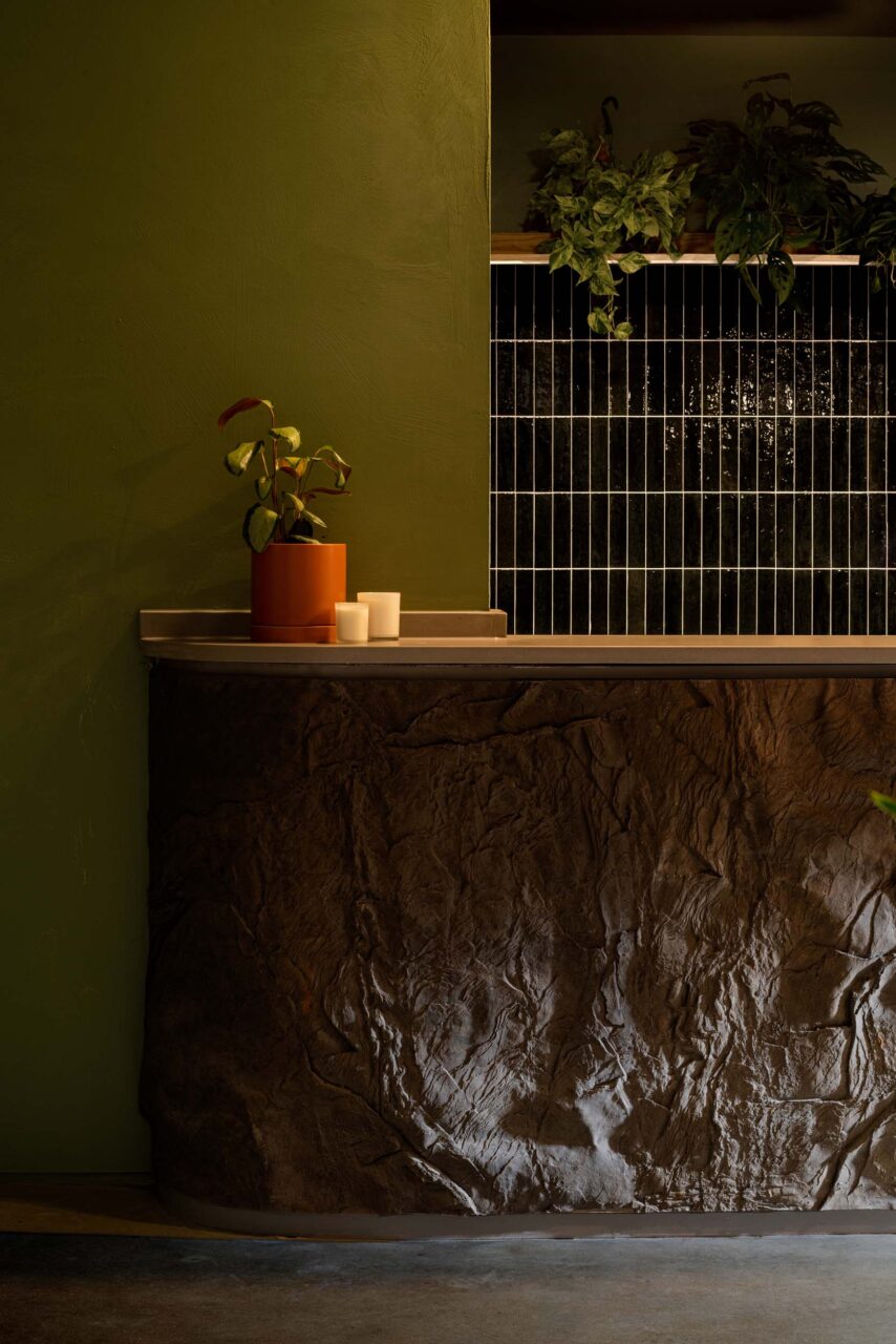 drummond projects creates boulder-like cafe counter