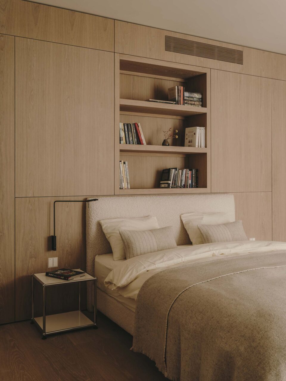 bedroom with wooden built-in storage