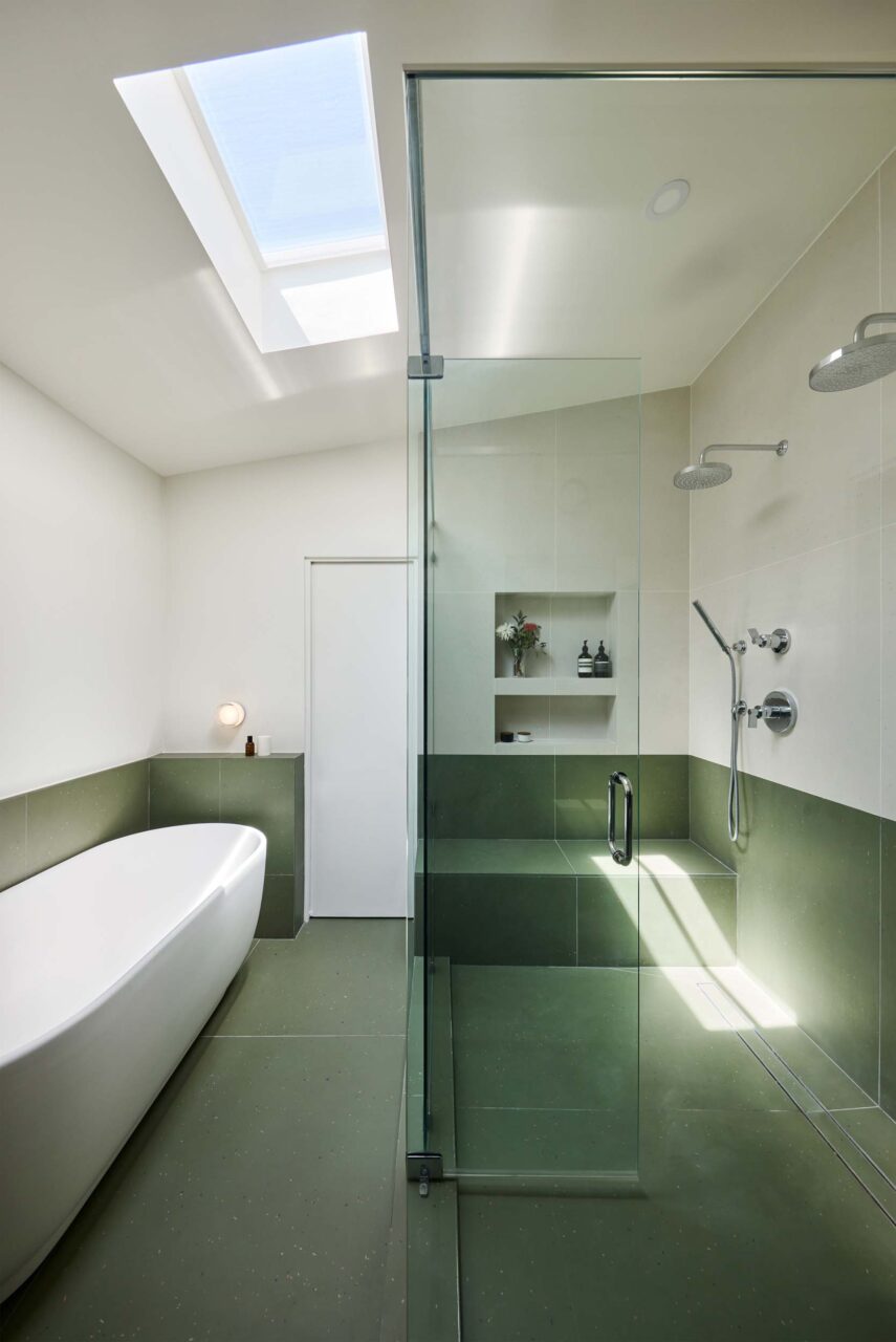 a green-tiled bathroom