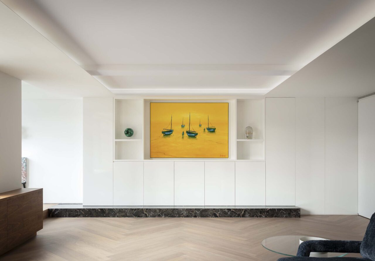 yellow artwork hanging on wall