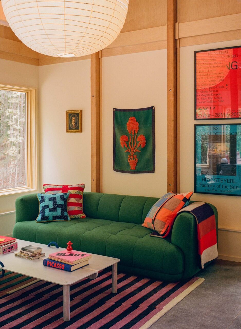 living room with green sofa