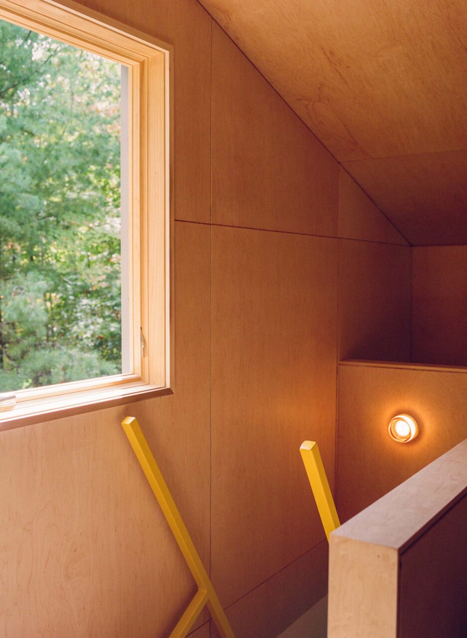 yellow stair at wood cabin