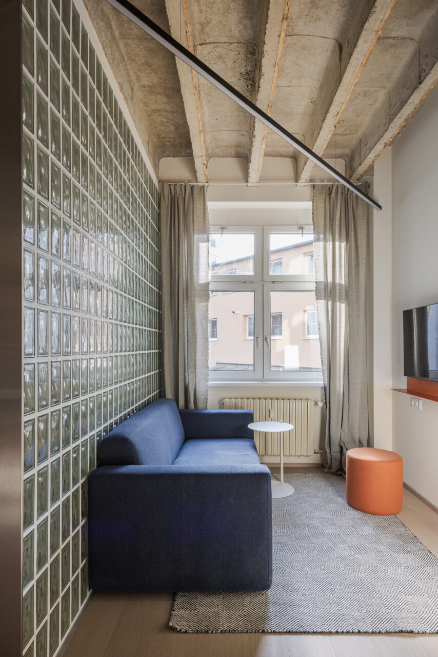 blue sofa in metropol apartments