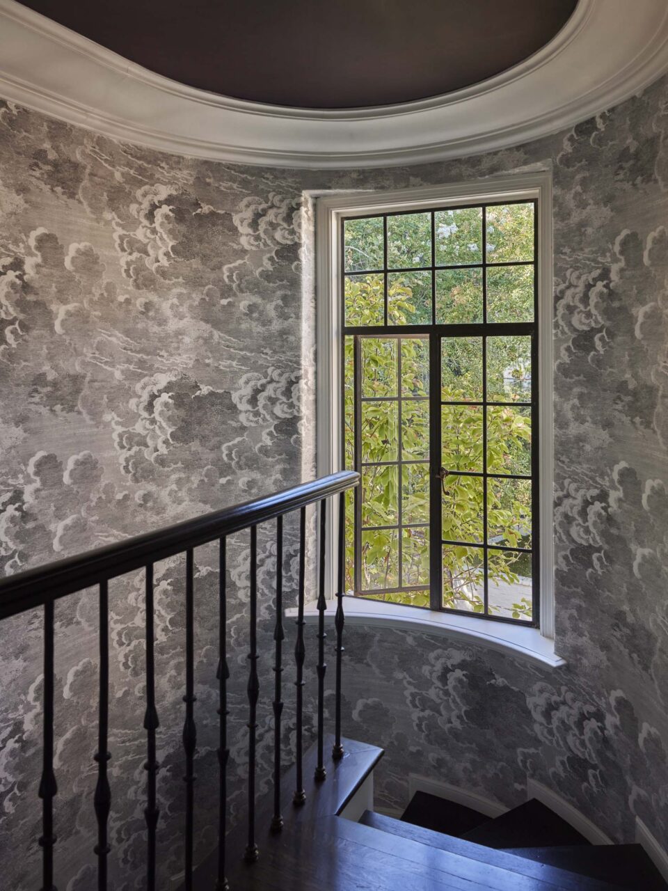 stairs with gray wallpaper at california home