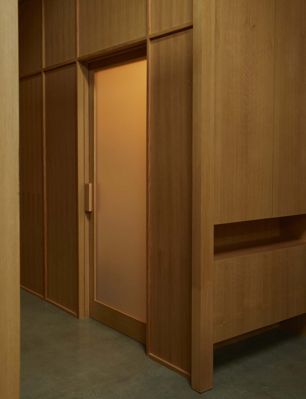 A wood hallway with a door
