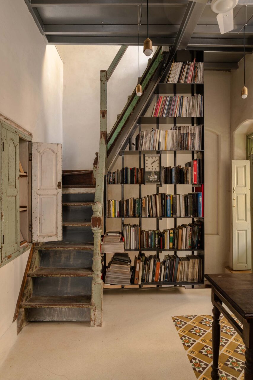 green staircase and cupboard