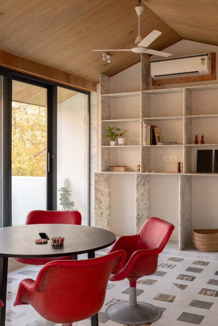 red chairs in office space for banduksmithstudio