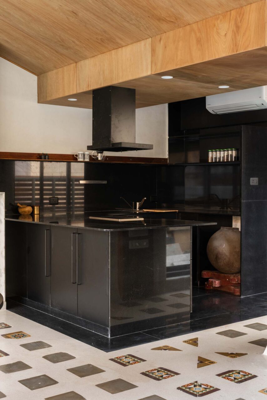 black kitchen cupboards and cabinets in guesthouse