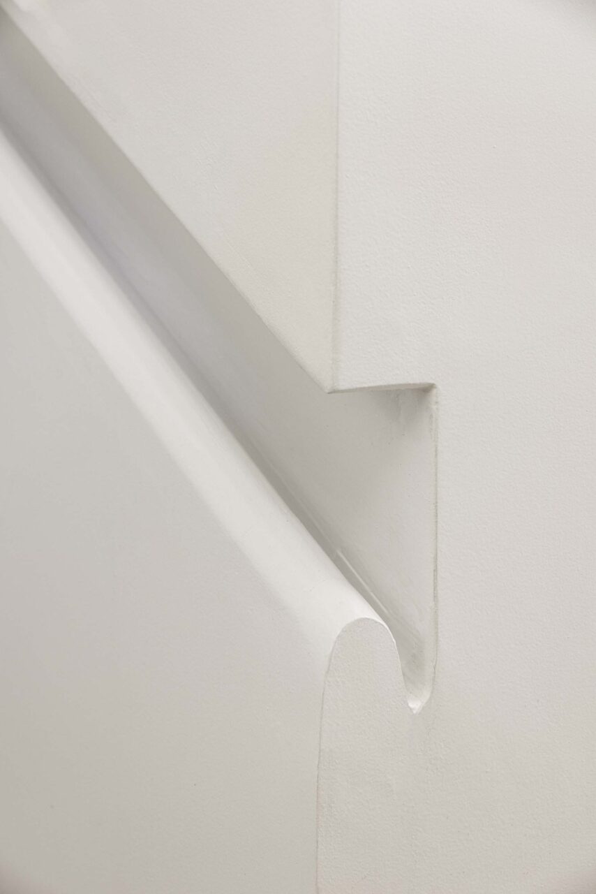 rounded railing in the wall