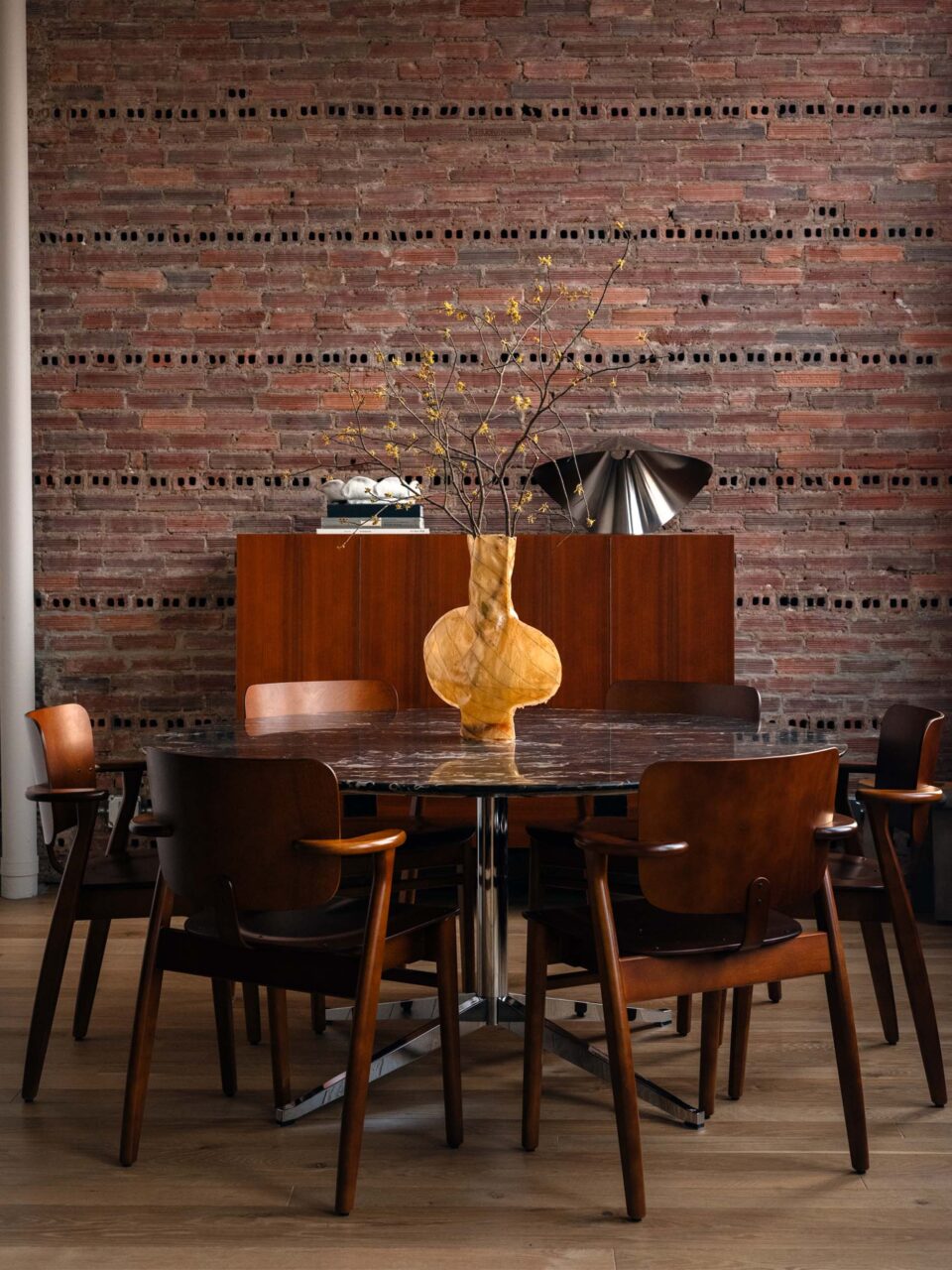 dining room with terracotta brick