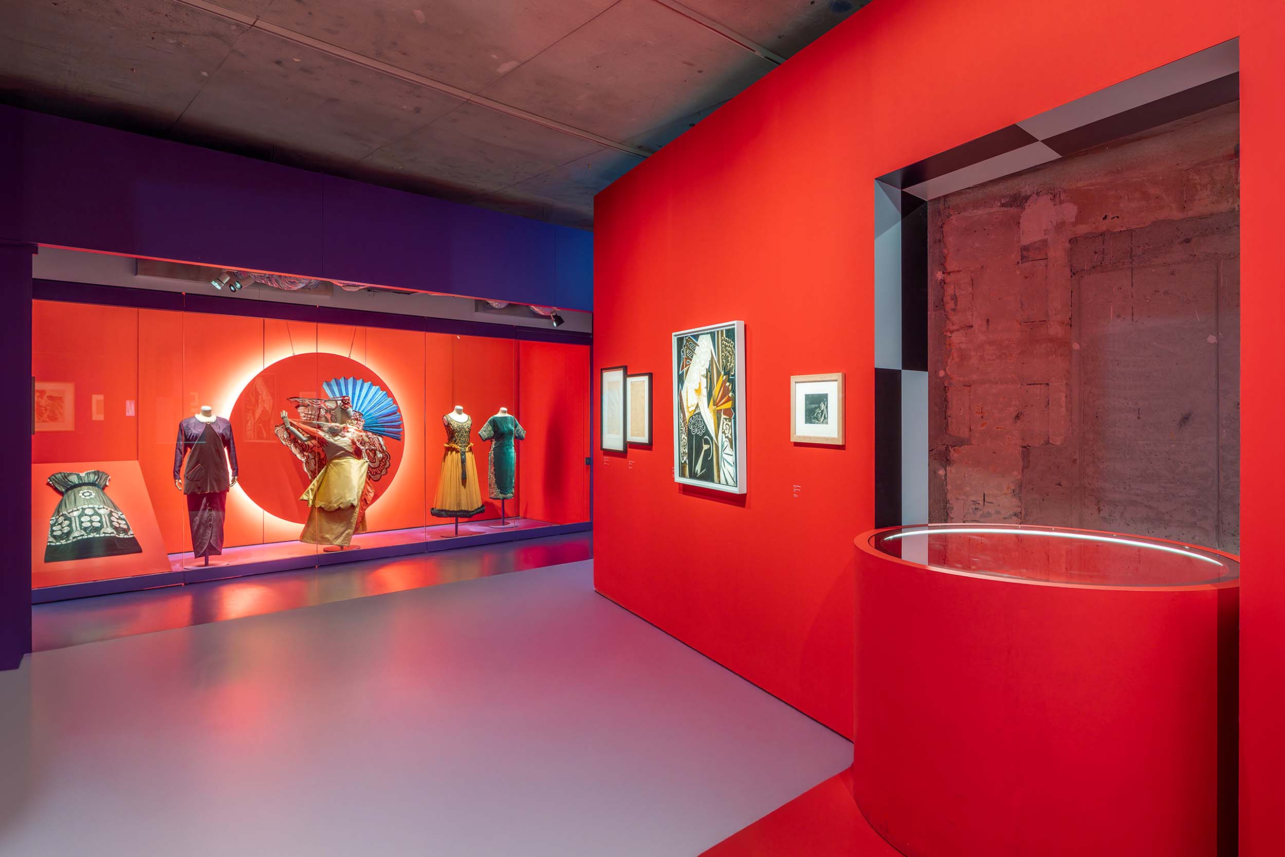 red walls with circular display case