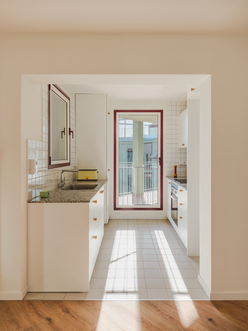 kitchen with white tiles