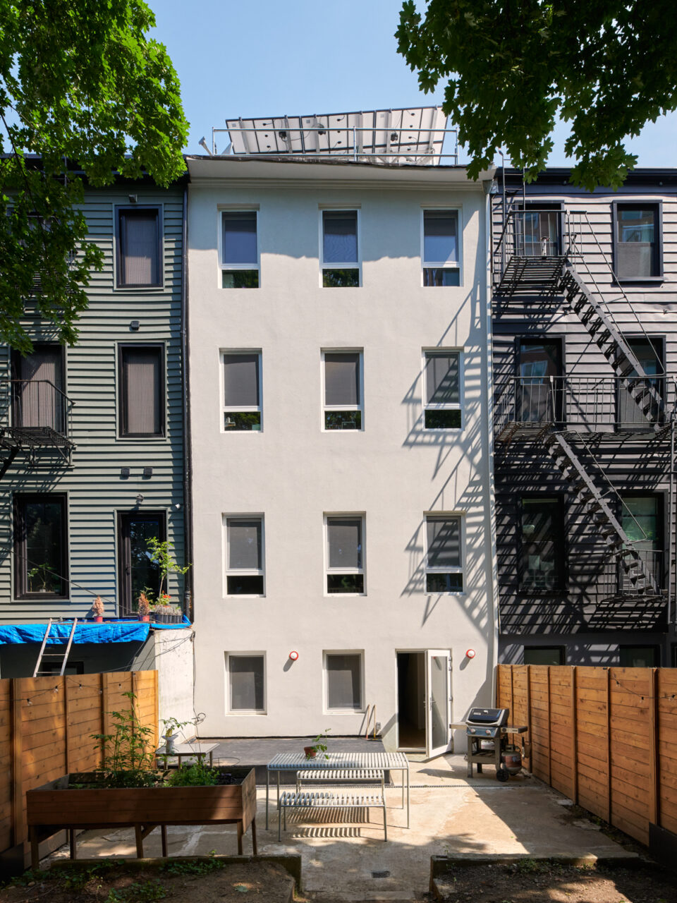 rear facade of home in bed stuy