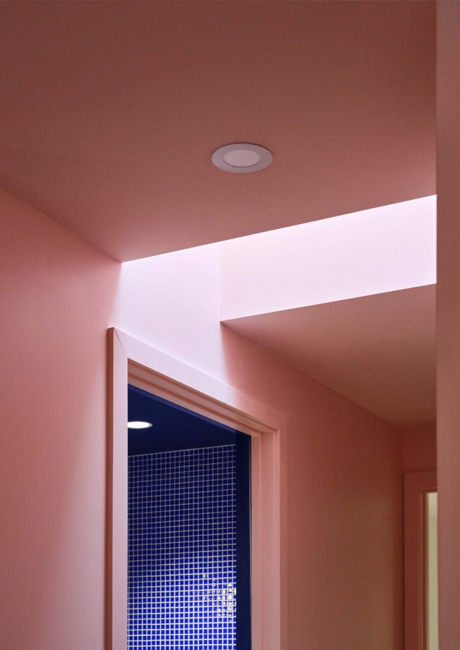 skylight in pink hallway