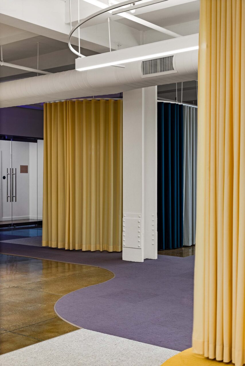 yellow drapes and purple carpet