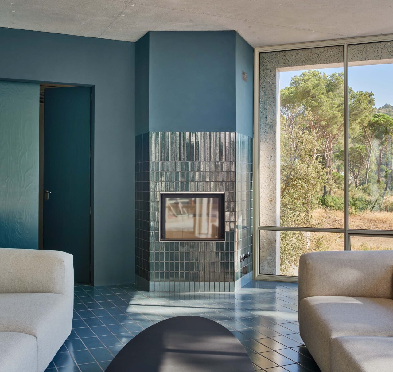 living room with blue fireplace