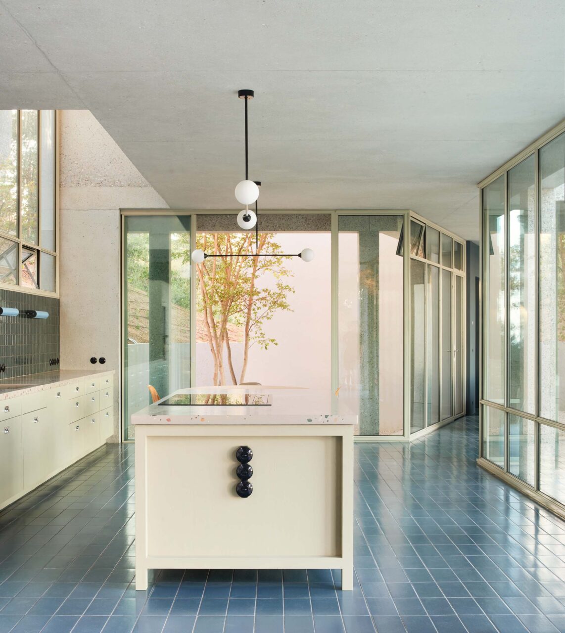 kitchen with baby blue sconces