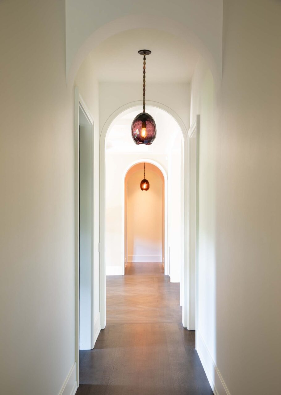hallway with arched ceiling