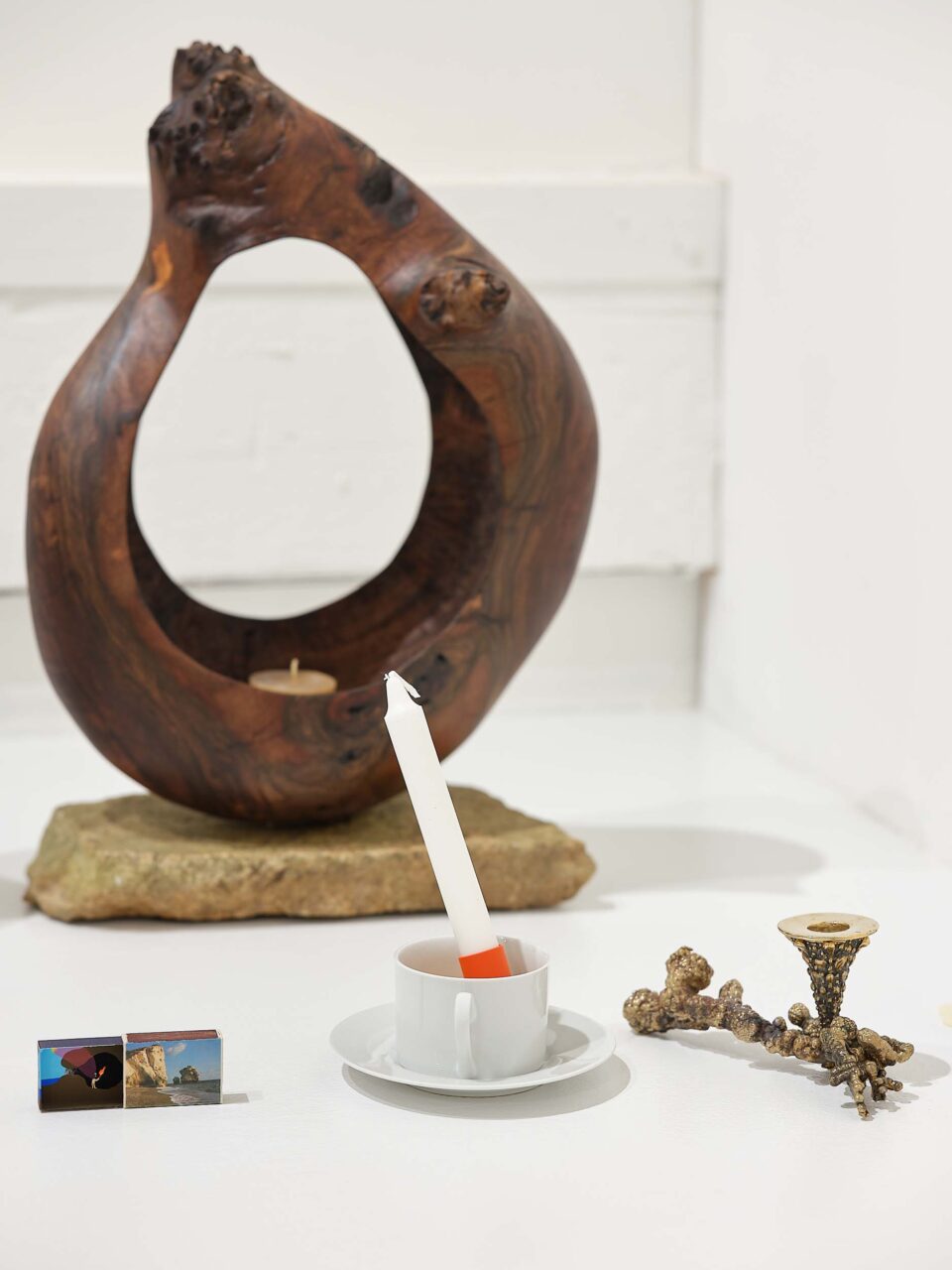 candle in tea cup