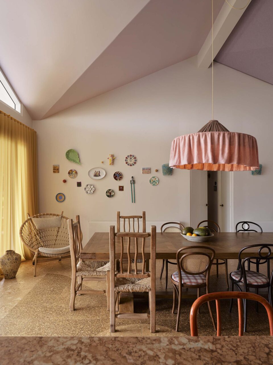 dinging room with different chairs