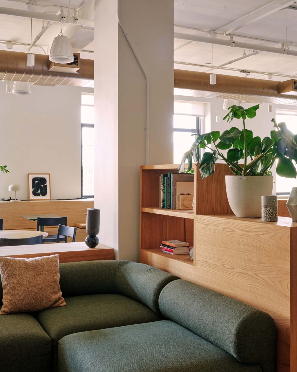green sofa with wood built-ins